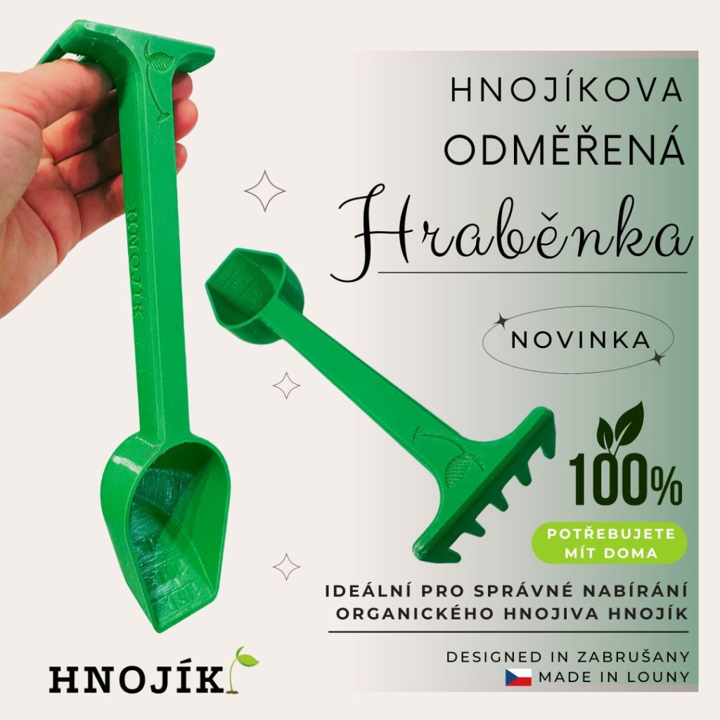 Grüne Düngee-Grabengabel mit ergonomischem Griff in der Hand, ideal zum Auflockern und Belüften von Gartenböden.