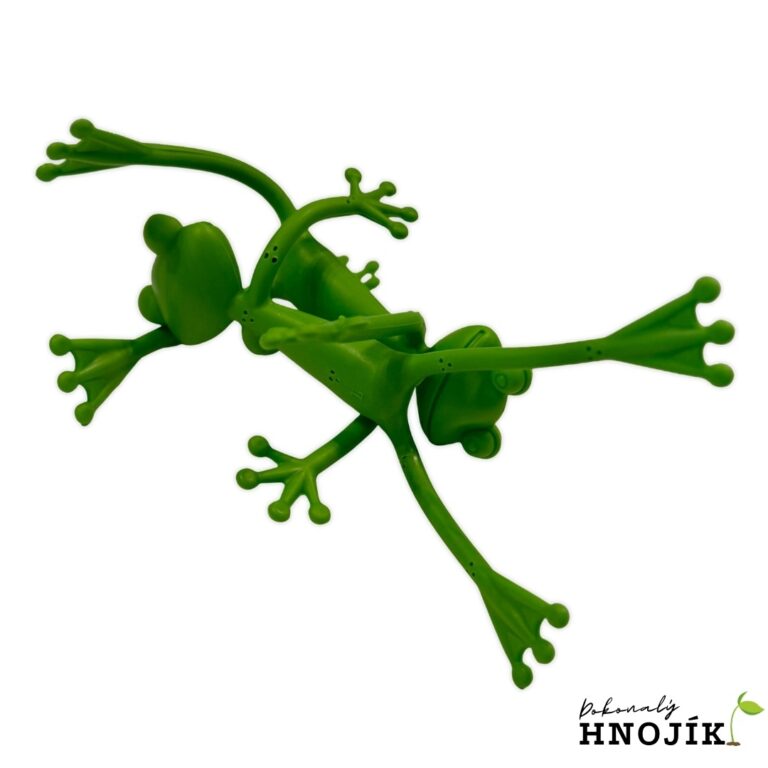Grüne Froschfigur mit ausgestreckten Gliedmaßen auf weißem Hintergrund