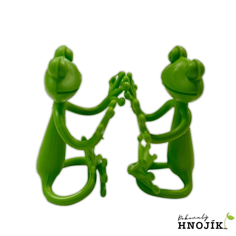 Zwei grüne Froschfiguren, die sich die Hände reichen